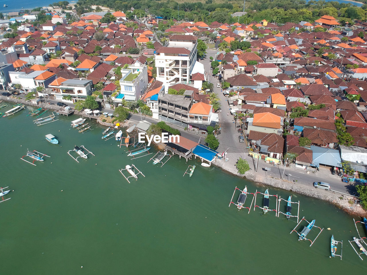 High angle view of buildings, boats and sea