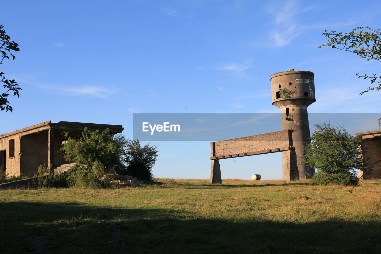 Low angle view of built structure against blue sky