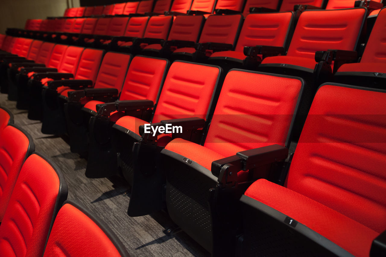 High angle view of empty chairs in movie theater