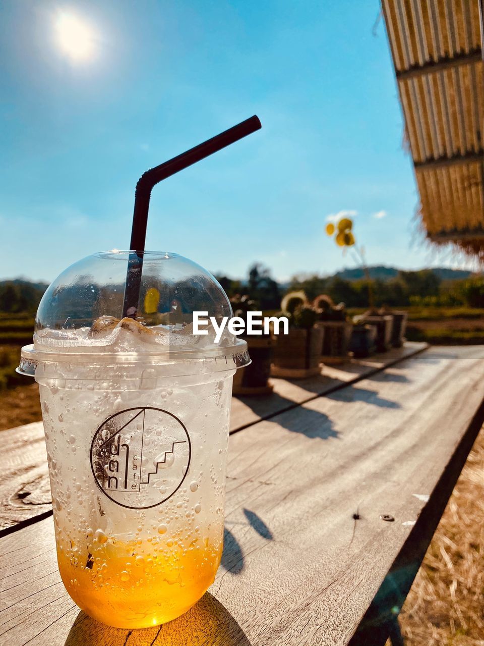 CLOSE-UP OF DRINK ON TABLE