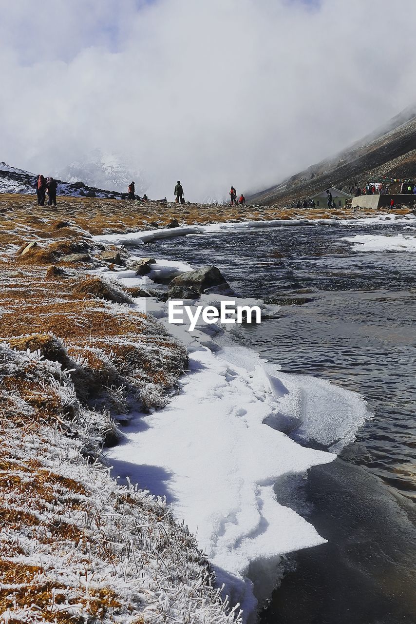 Frozen mountain stream and alpine valley at zero point, popular tourist destination in sikkim, india