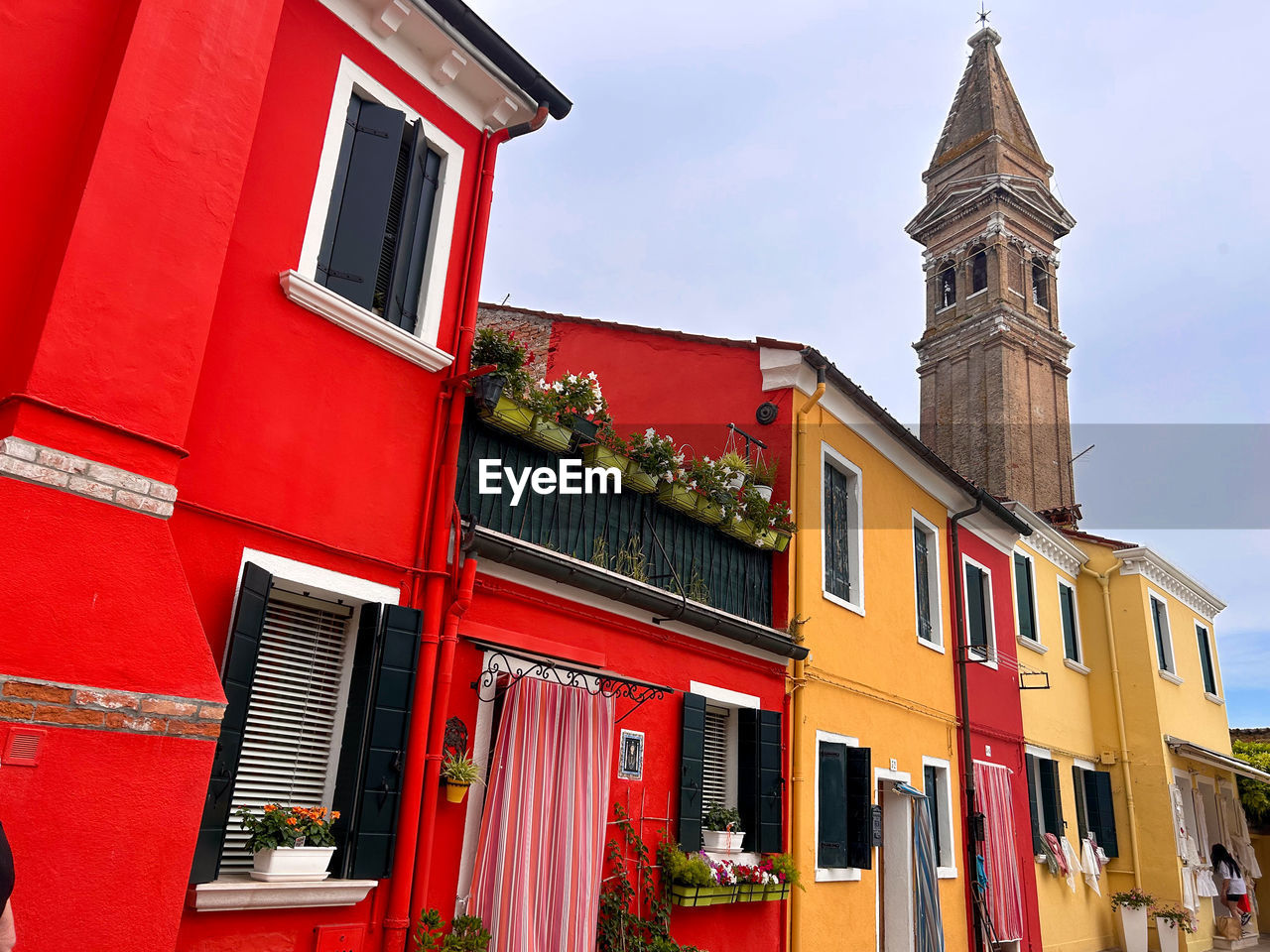architecture, building exterior, built structure, building, town, city, travel destinations, facade, nature, red, history, the past, tourism, tower, travel, sky, window, house, neighbourhood, street, outdoors, no people, day, residential district, place of worship, religion, downtown, low angle view, tradition, holiday