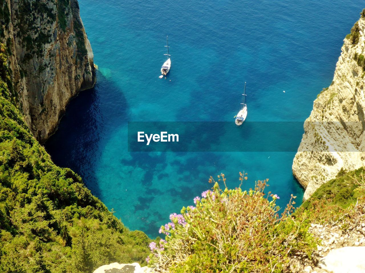 High angle view of rocks by sea