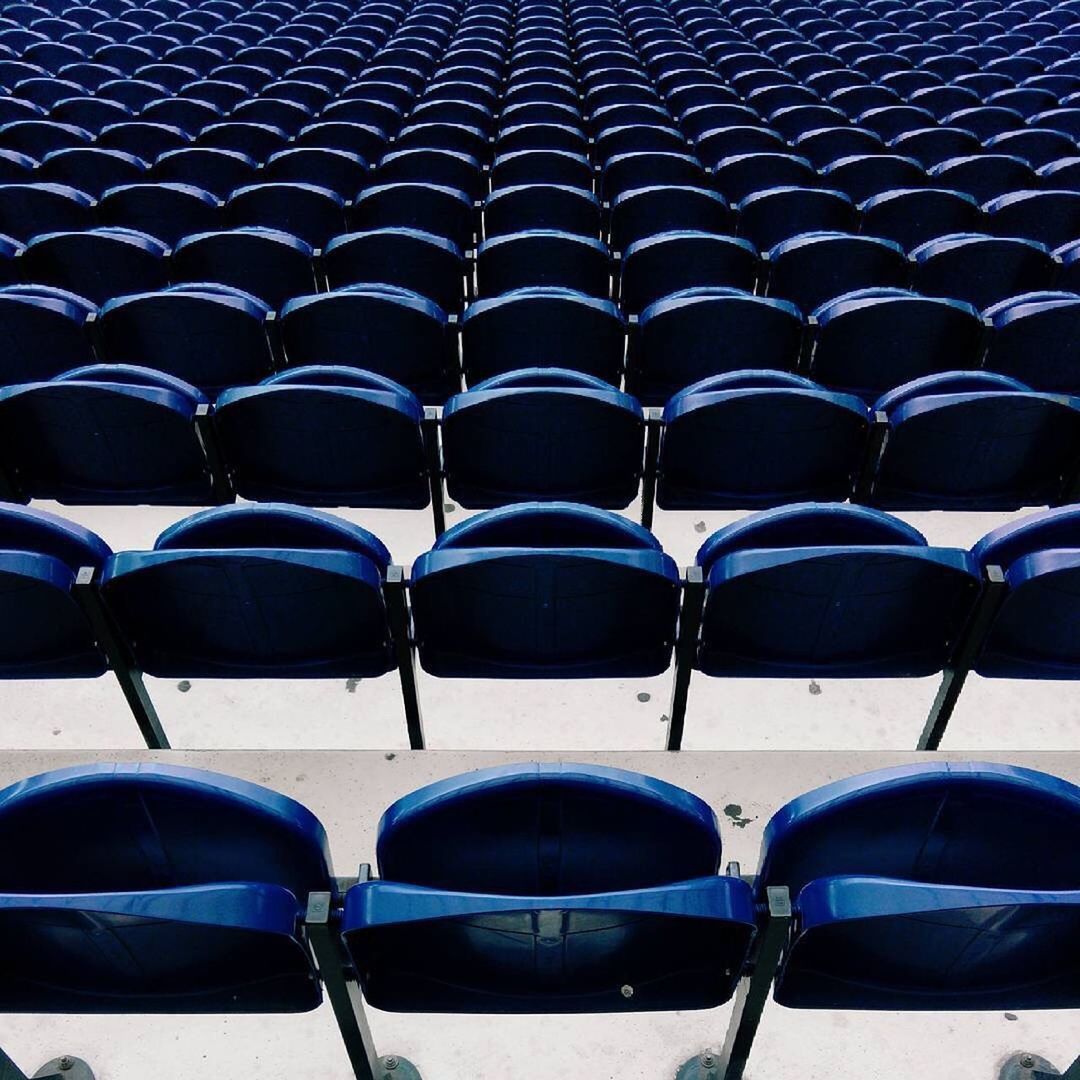 FULL FRAME SHOT OF EMPTY CHAIRS IN ROWS