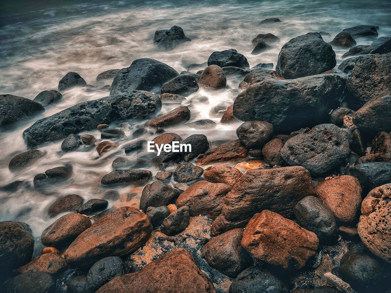 Aerial view of pebbles at beach