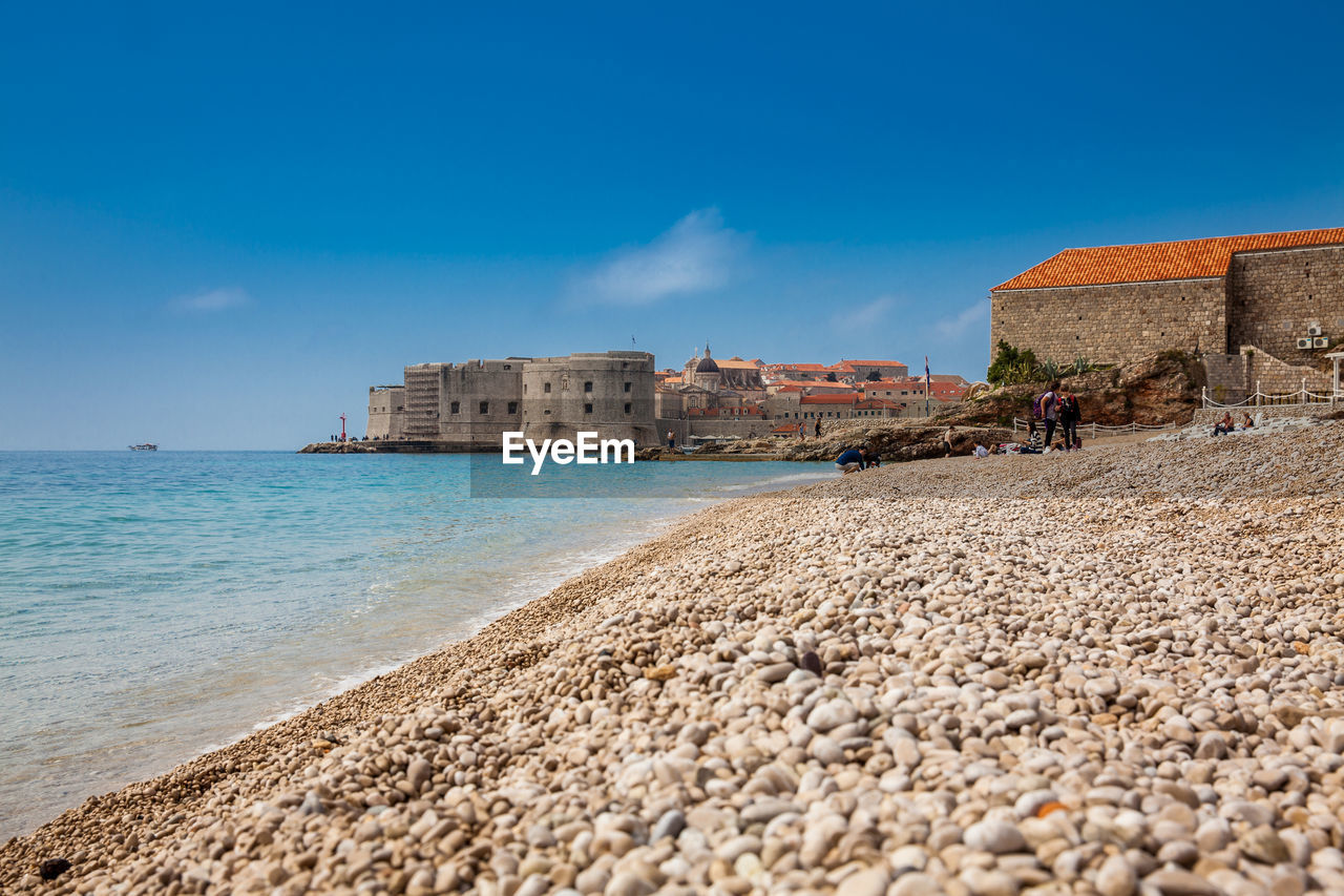 The beautiful banje beach and dubrovnik city