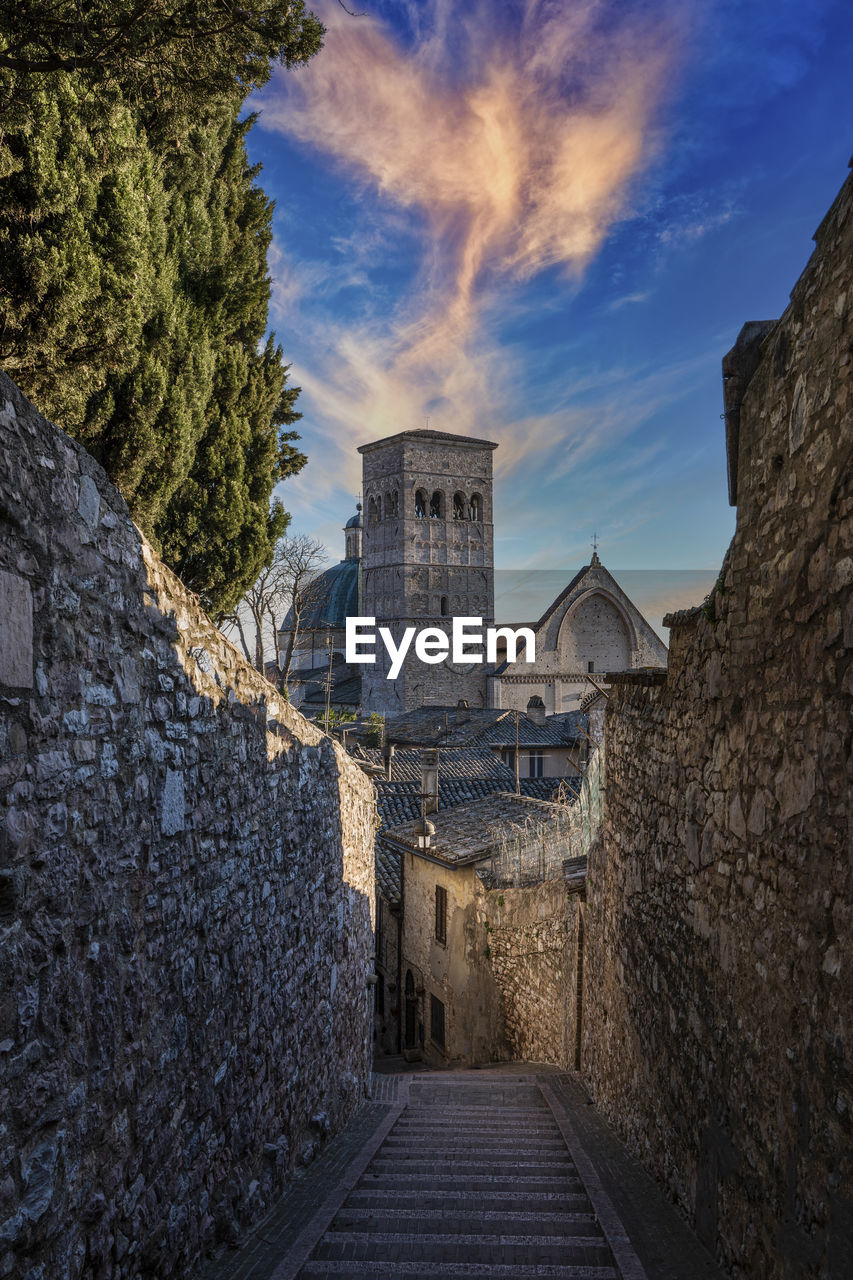 Stairway and view of the church of san rufino in the city of assisi