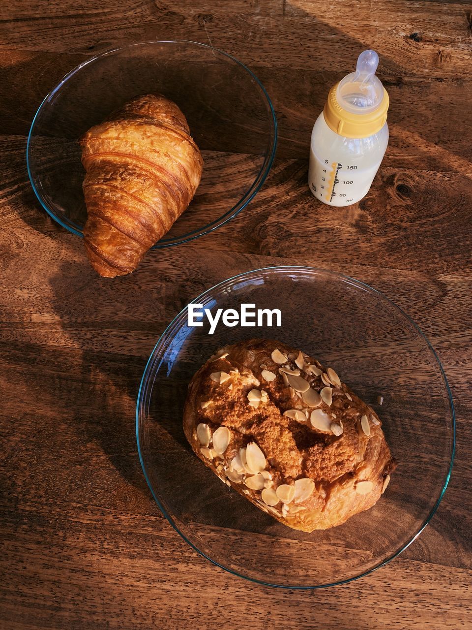 High angle view of breakfast on table for adults and baby