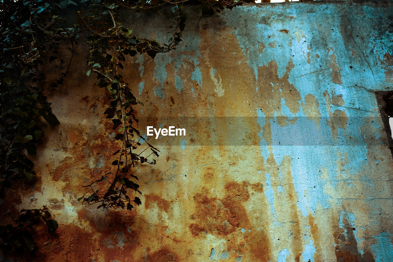 weathered, old, no people, damaged, rusty, backgrounds, rust, decline, deterioration, full frame, abandoned, wall - building feature, wall, rundown, textured, metal, bad condition, reflection, architecture, close-up, built structure, peeling off, day, dirt, painting, peeled, blue, pattern, indoors, rough, stained, art