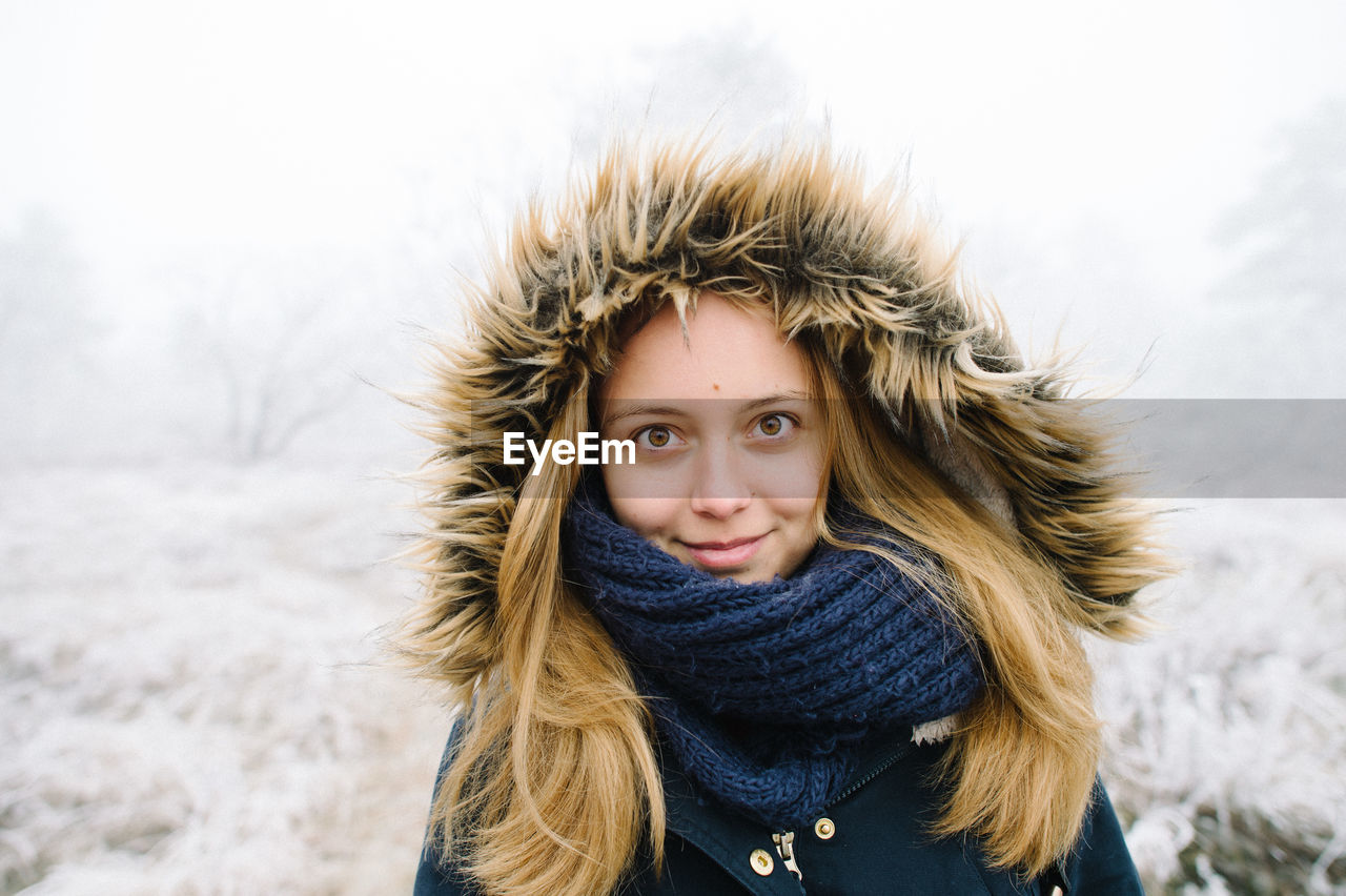 Portrait of woman in snow