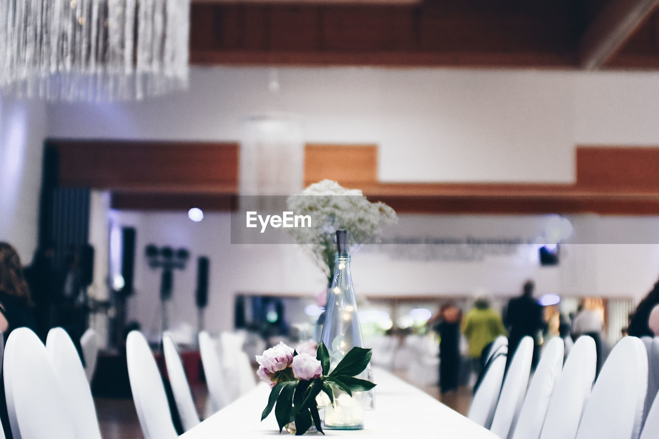 Flower vases on table