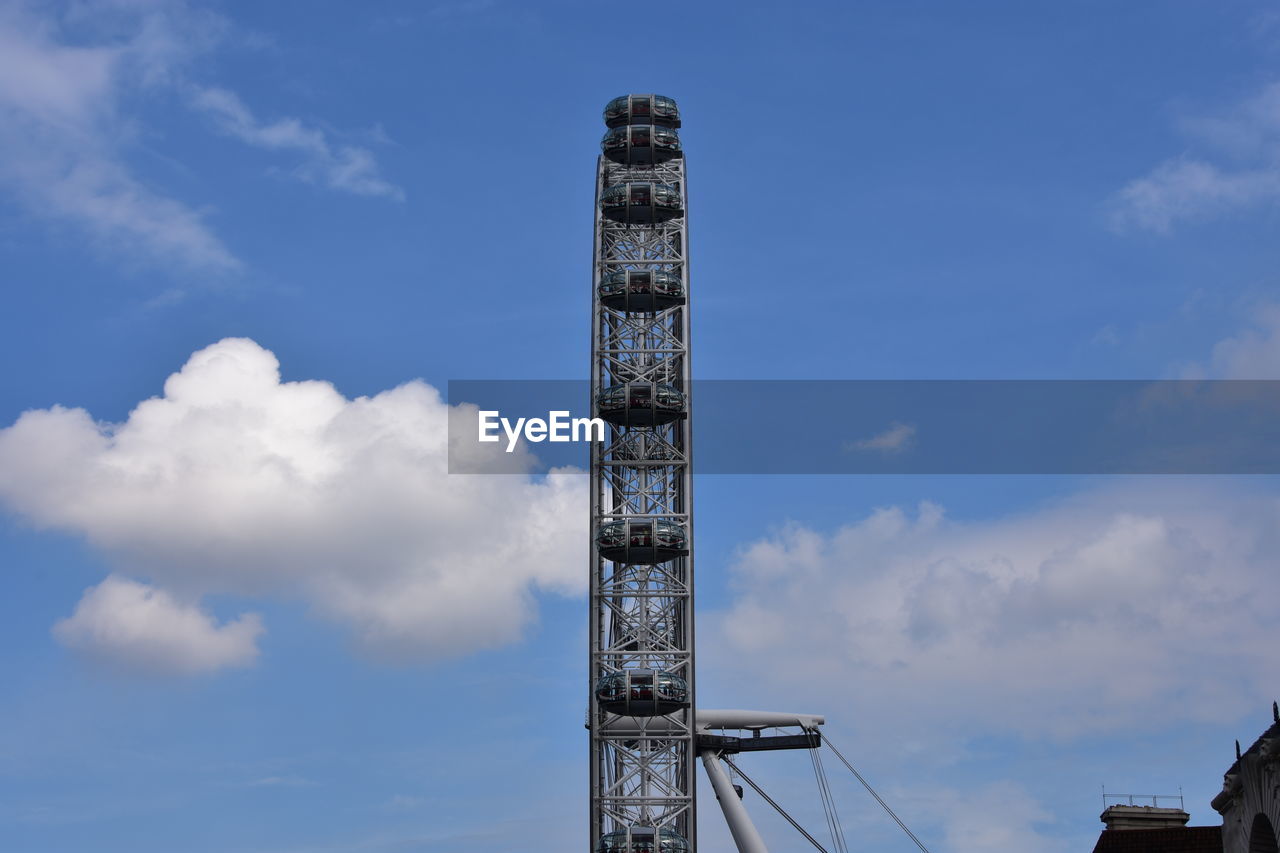 LOW ANGLE VIEW OF COMMUNICATIONS TOWER AGAINST SKY