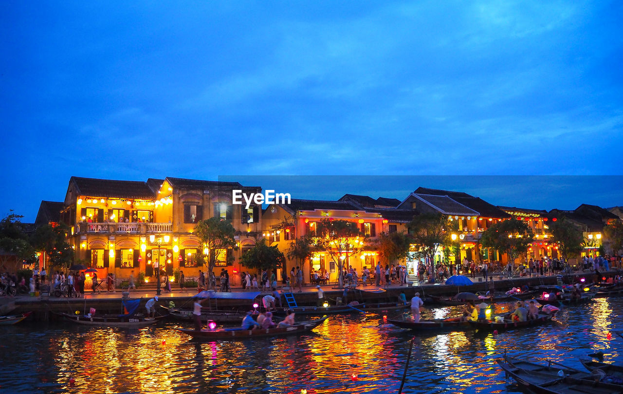 Illuminated buildings in city at night