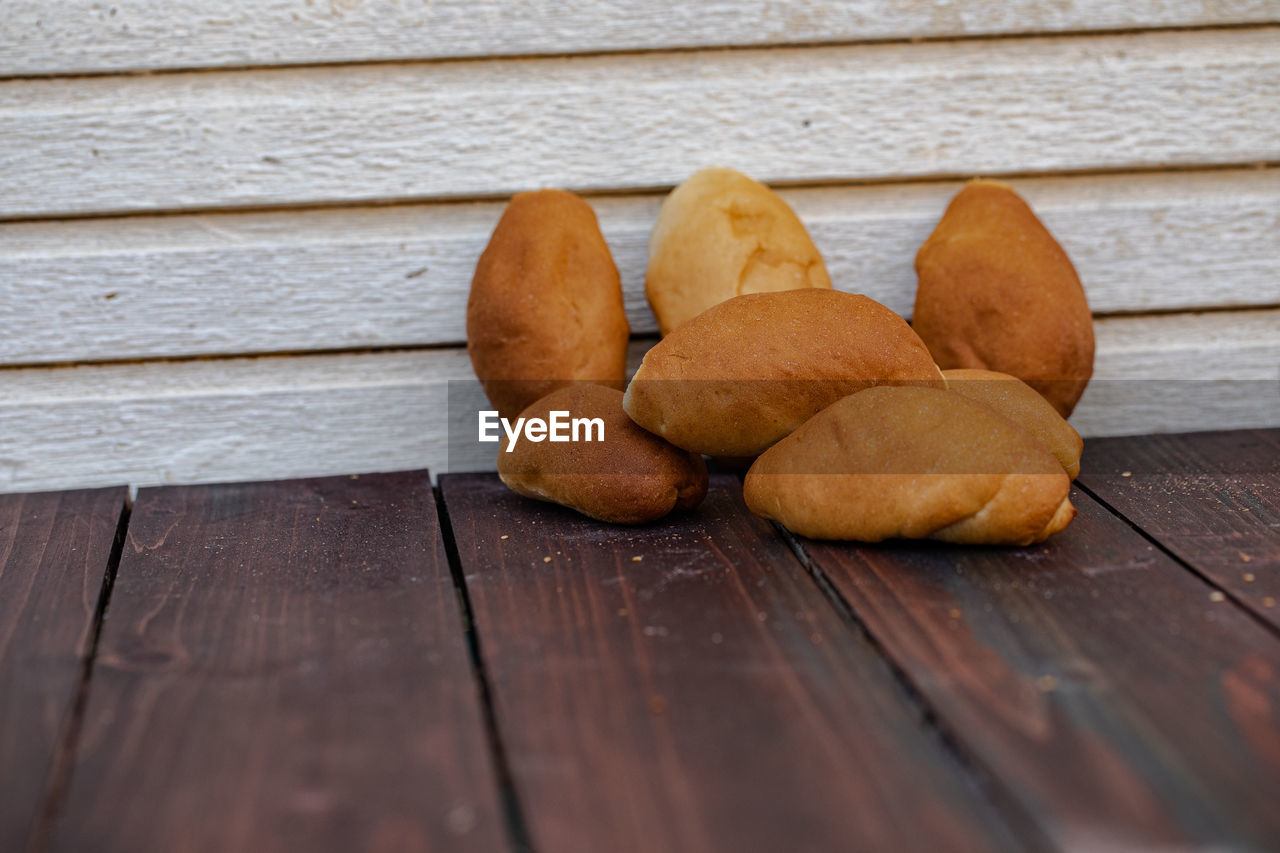 CLOSE-UP OF BREAD ON TABLE