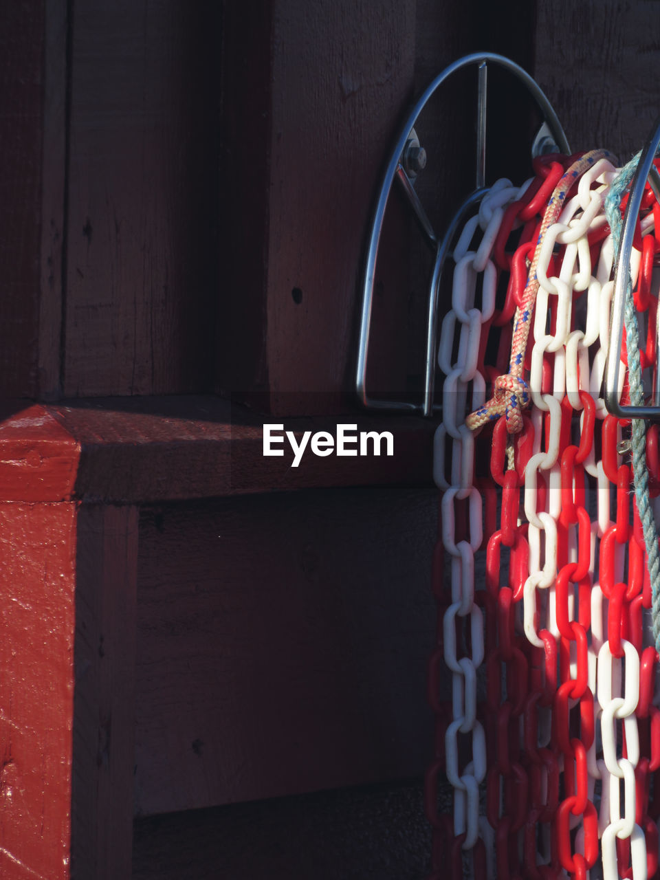 CLOSE-UP OF RED WICKER BASKET ON TABLE