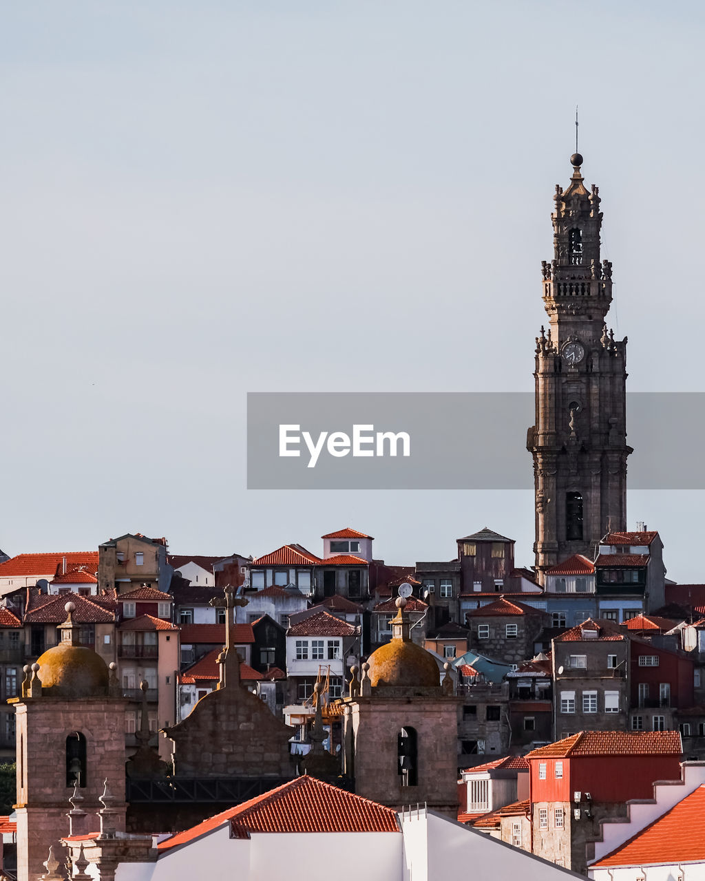 Buildings against clear sky in city