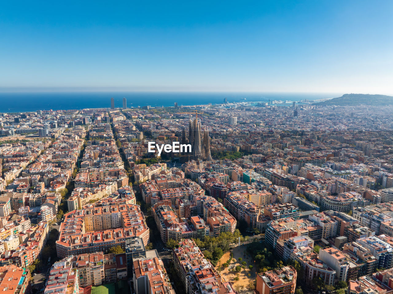 high angle view of townscape against clear blue sky