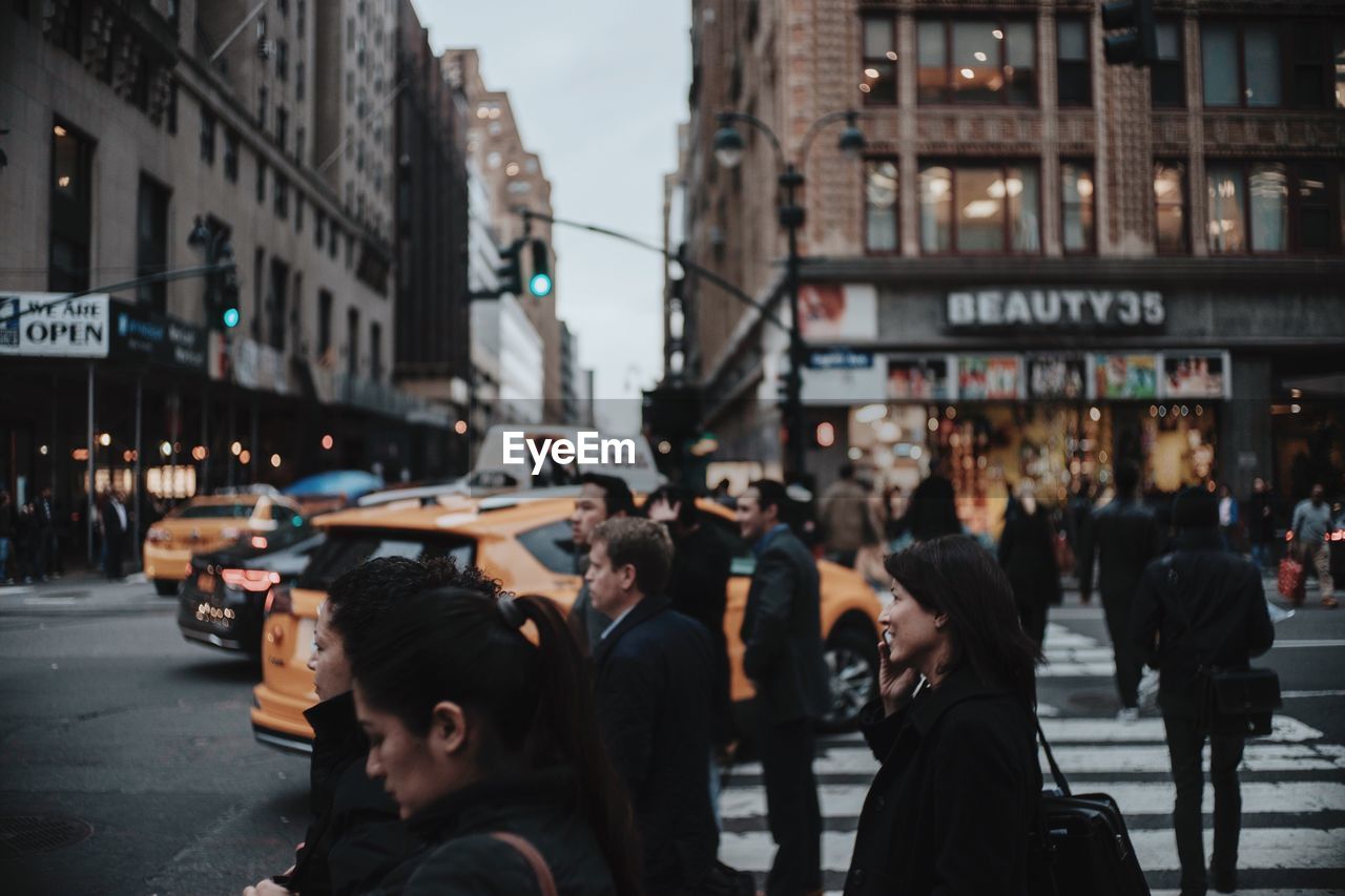 PEOPLE WALKING ON STREET