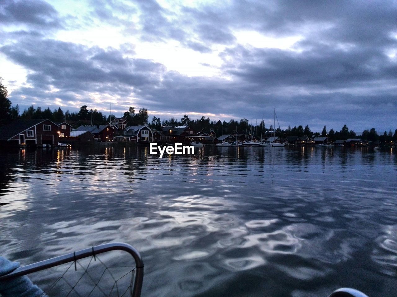 REFLECTION OF CLOUDY SKY ON WATER