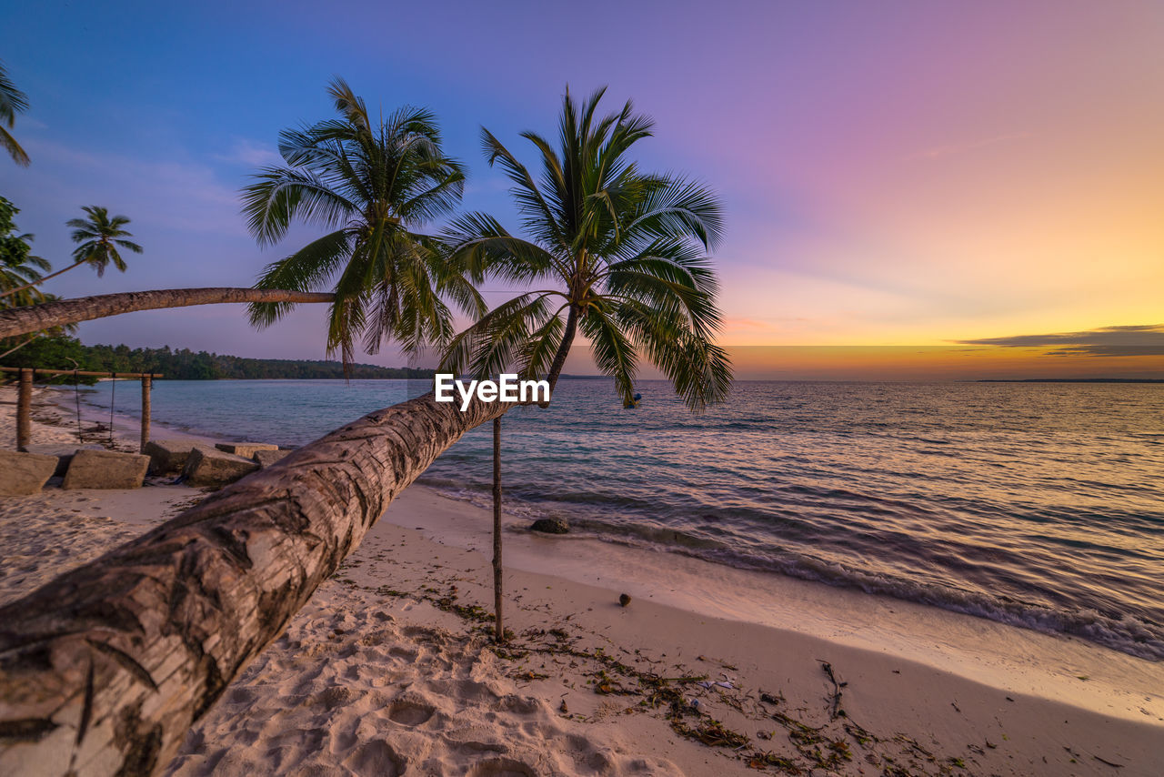 Scenic view of sea against sky at sunset