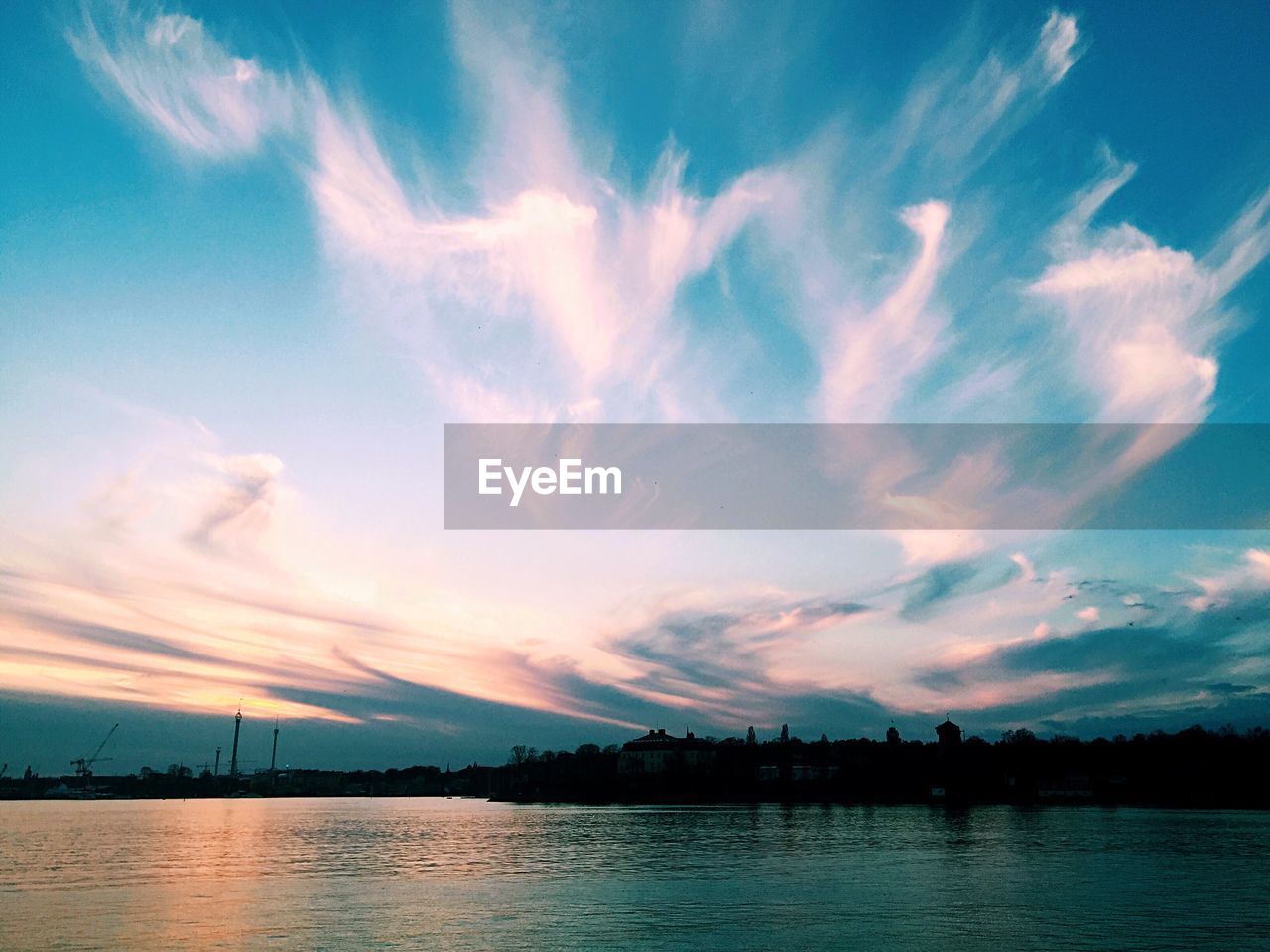 Scenic view of sea at sunset