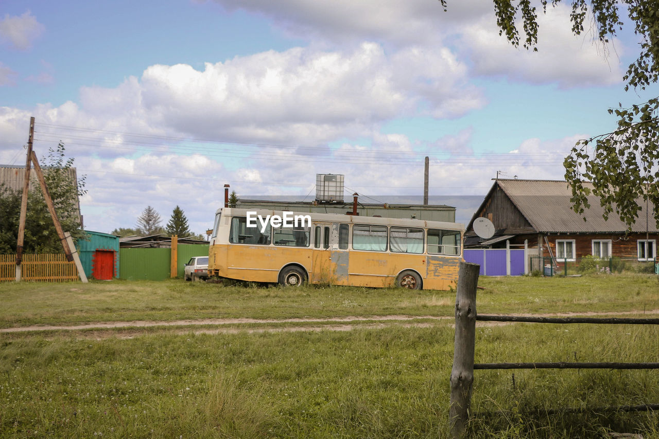 House on field against sky