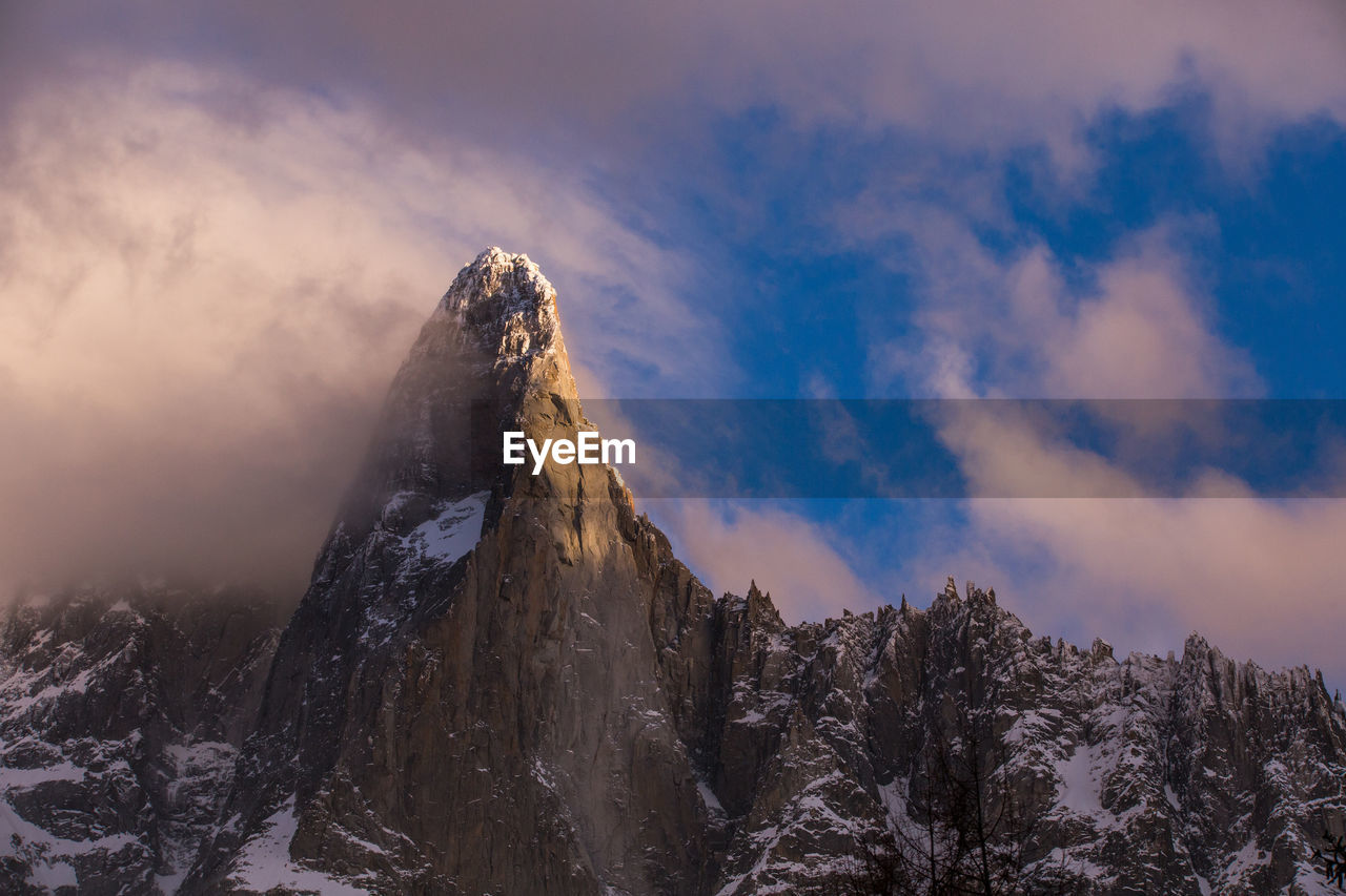 SCENIC VIEW OF SNOWCAPPED MOUNTAIN AGAINST SKY