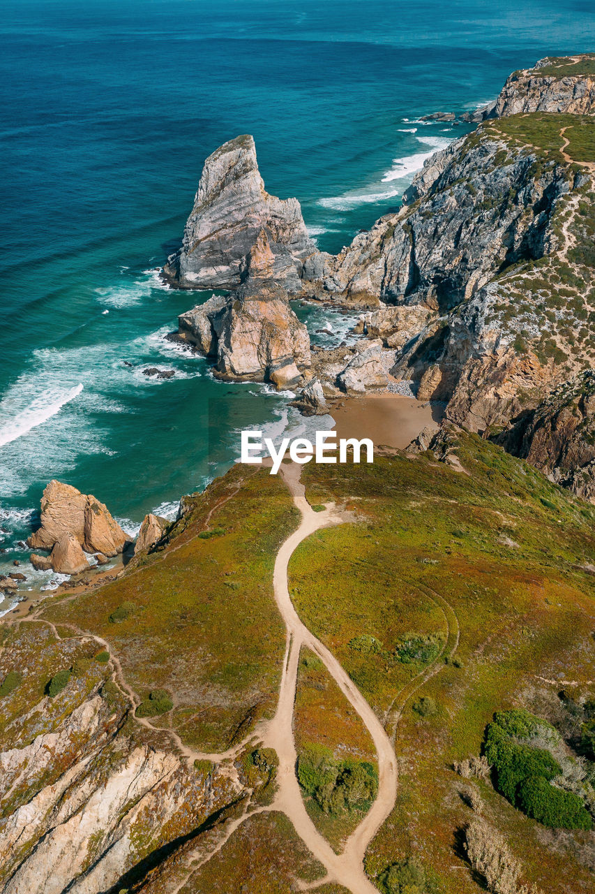 High angle view of rocks on shore