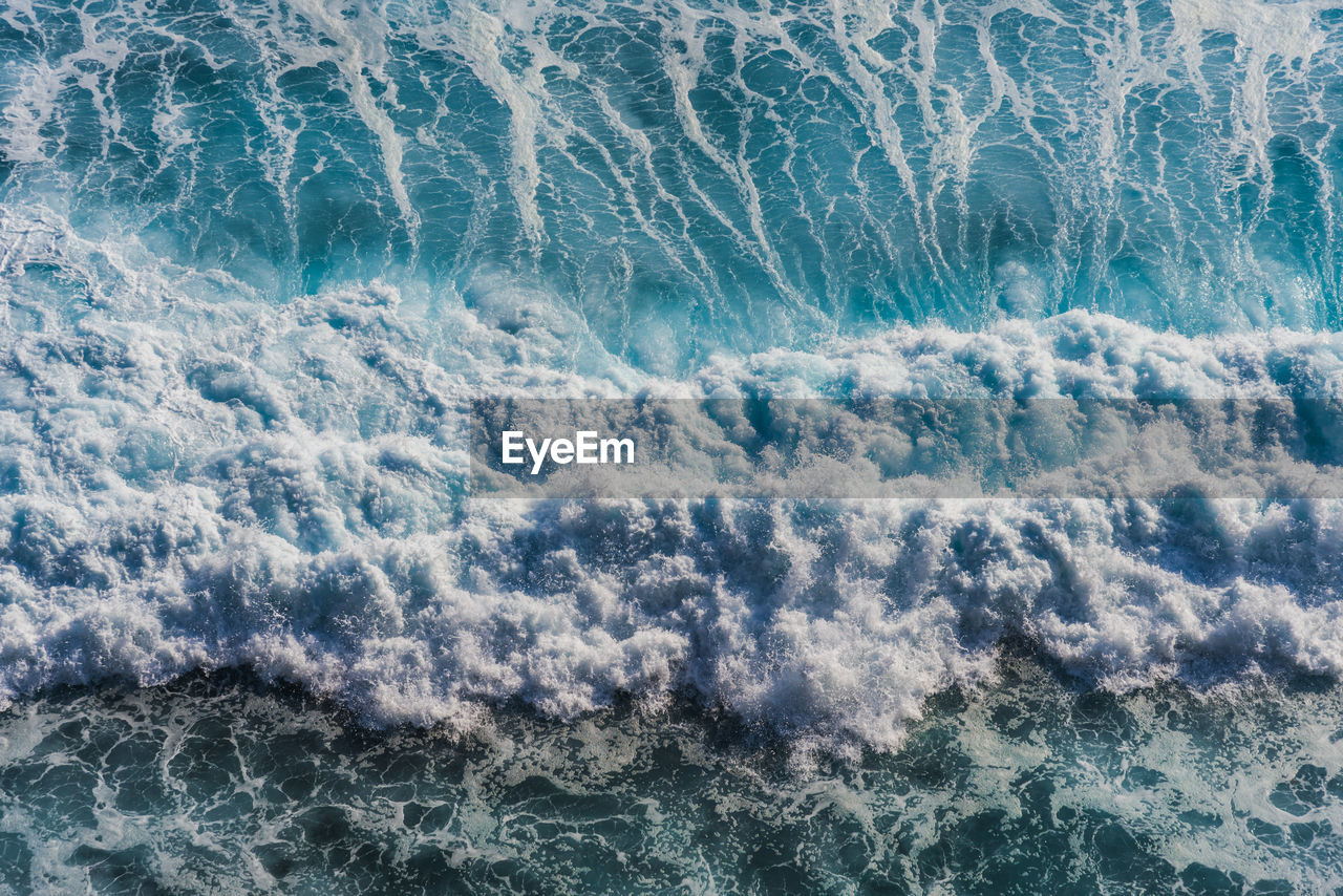 High angle view of waves in sea