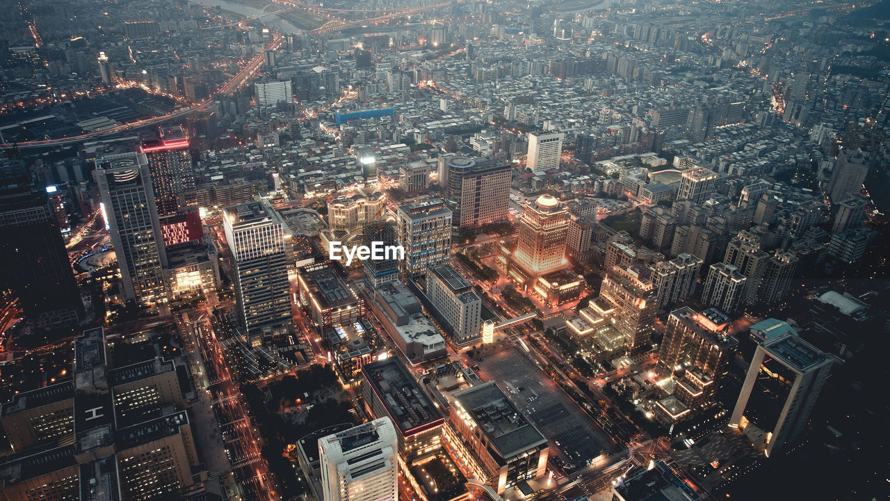 High angle view of illuminated cityscape