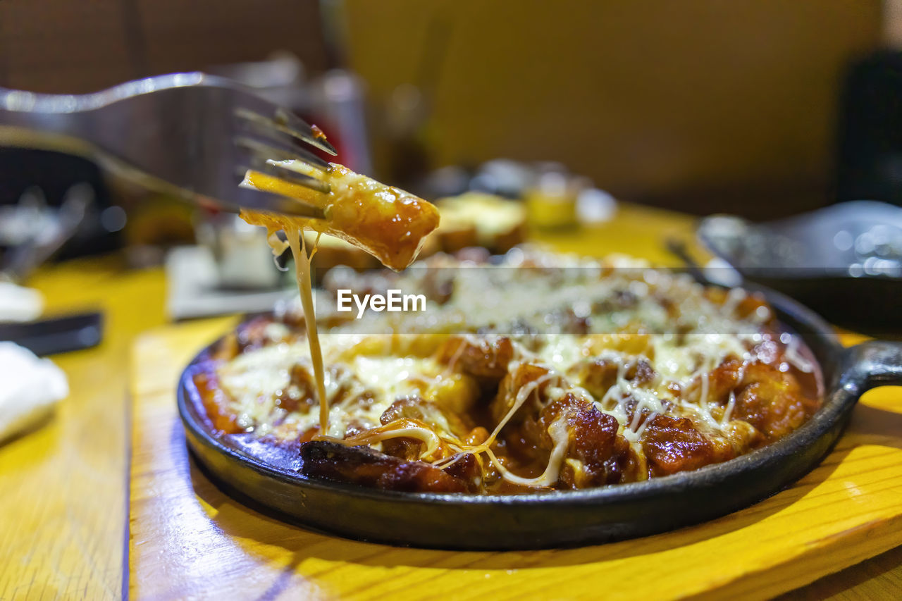 CLOSE-UP OF FOOD ON TABLE