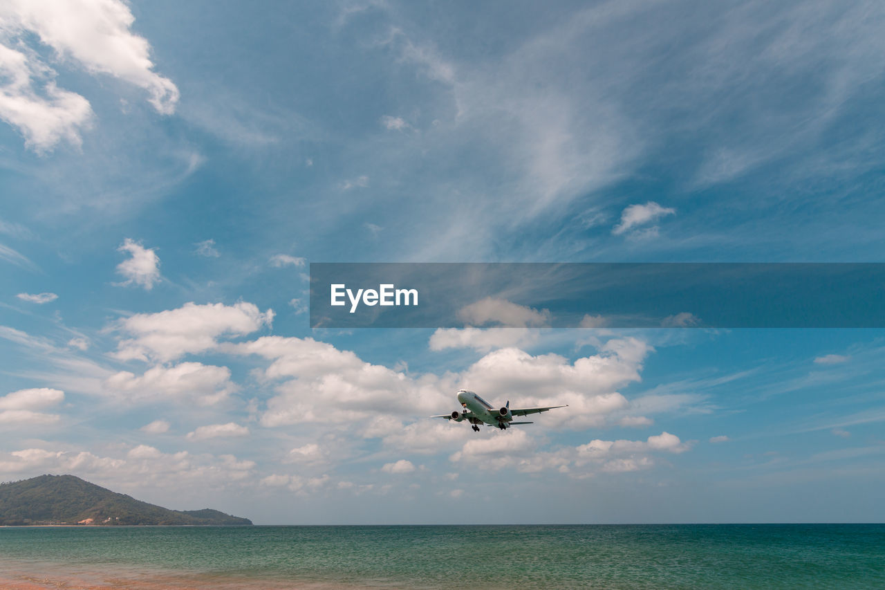 Scenic view of airplane against sky