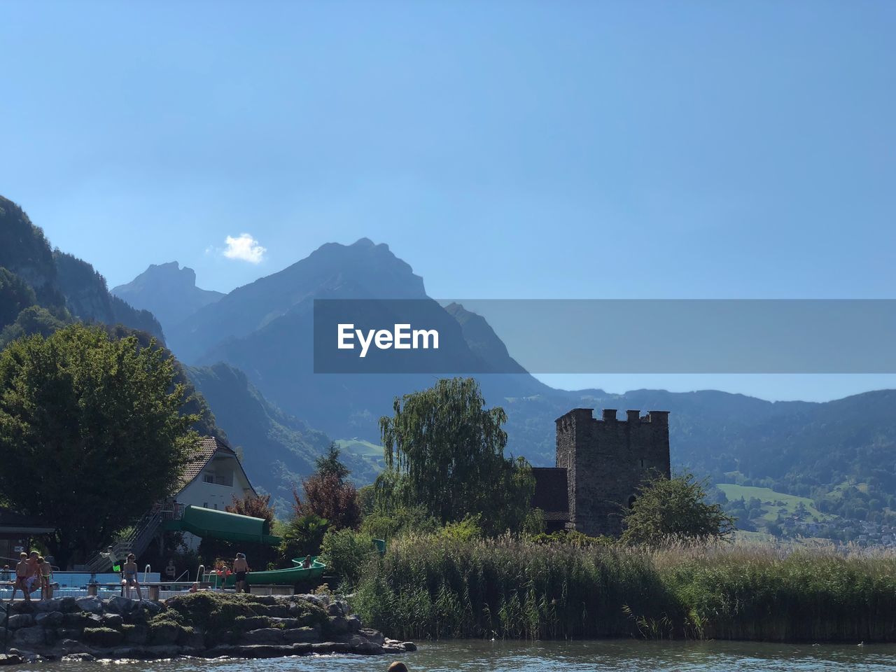 SCENIC VIEW OF MOUNTAINS AGAINST CLEAR SKY