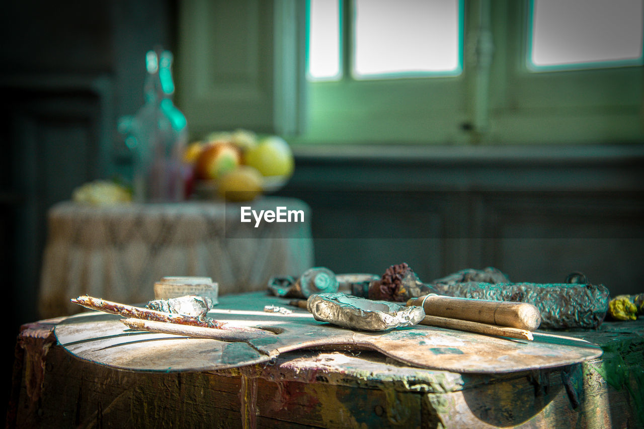 green, table, food and drink, blue, food, no people, indoors, focus on foreground, fruit, healthy eating, wood, window, still life, still life photography, freshness, day, room, nature