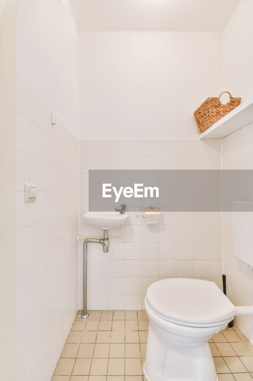 Close-up of toilet bowl in bathroom