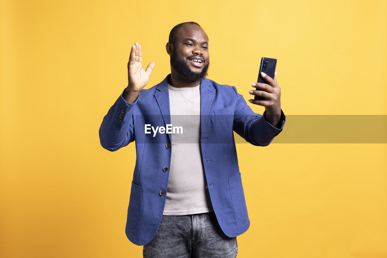 young man using mobile phone