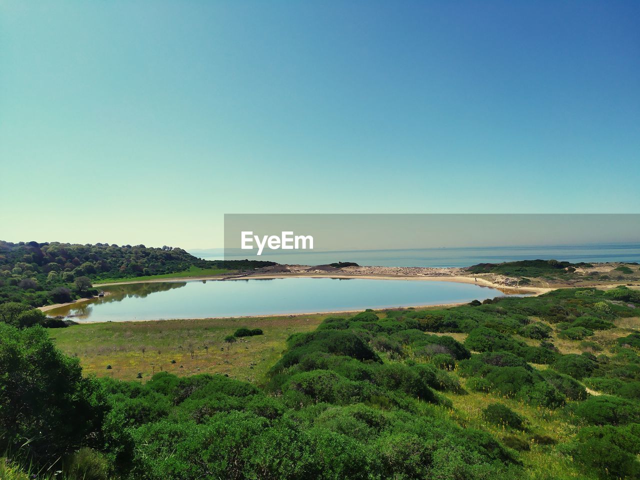 SCENIC VIEW OF LANDSCAPE AGAINST CLEAR BLUE SKY