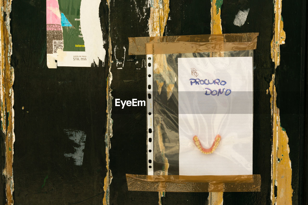 Close-up of dental cast hanging in plastic