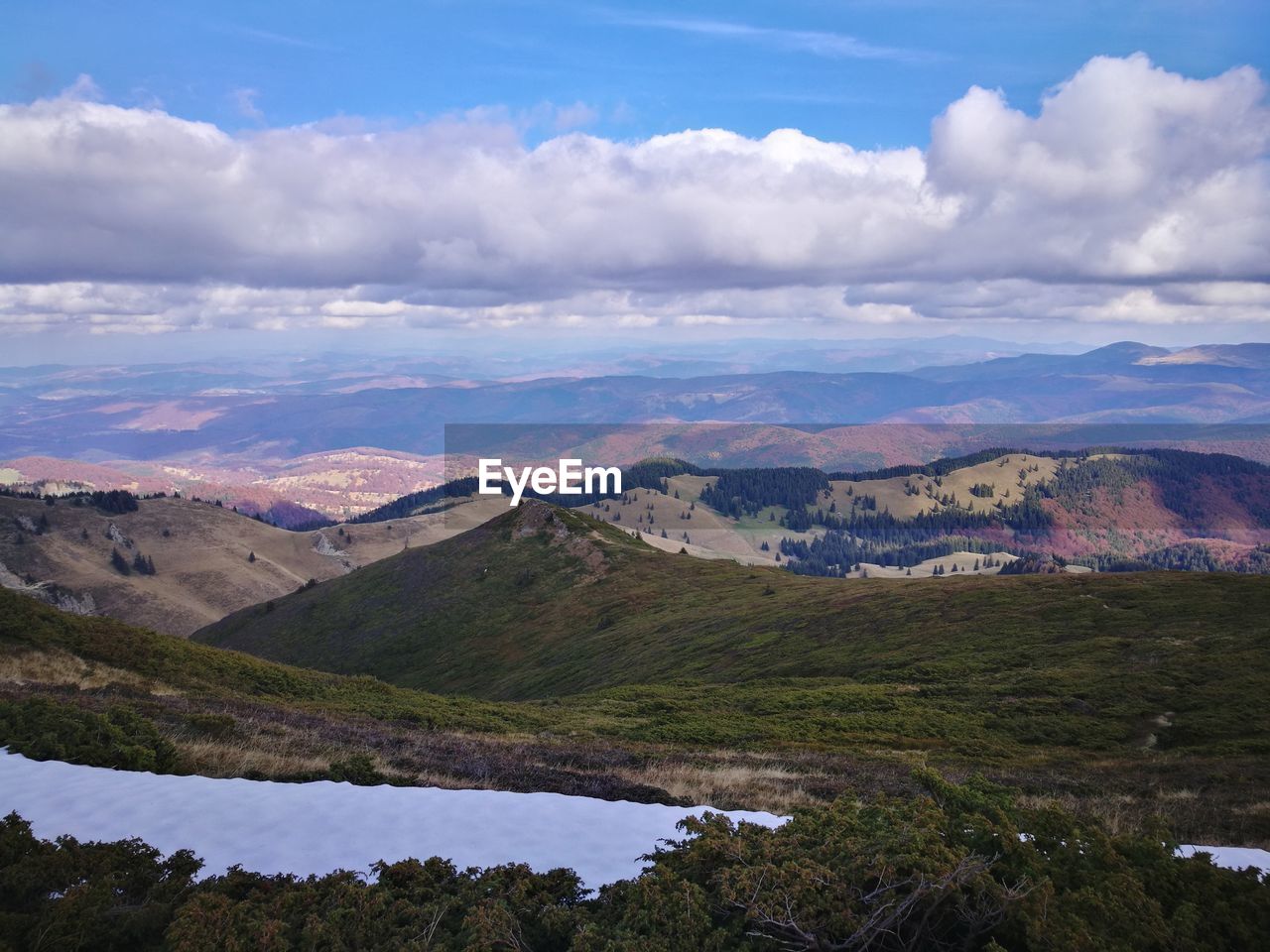 SCENIC VIEW OF LAND AND MOUNTAINS AGAINST SKY