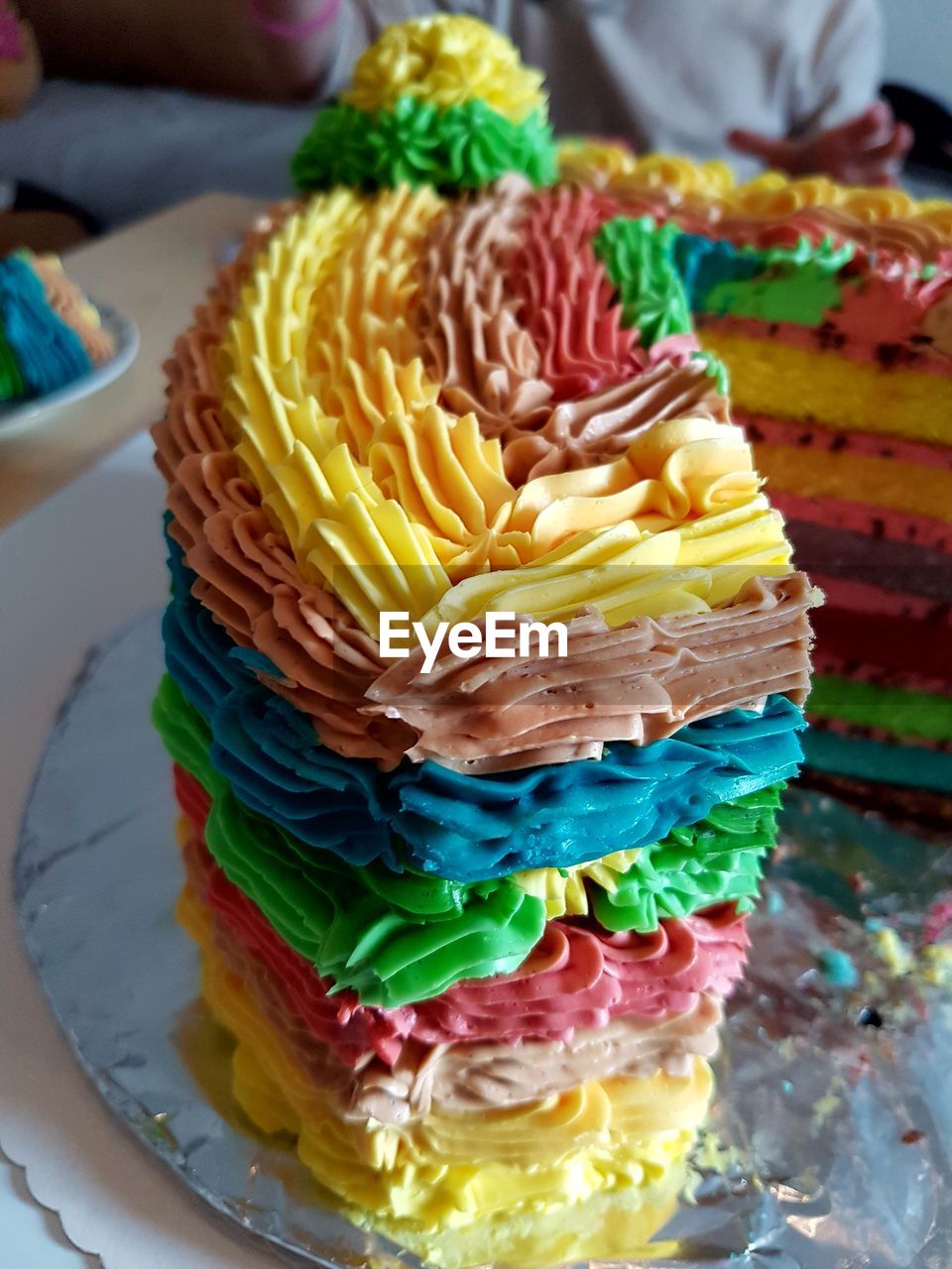 Close-up of colorful cake on table at home