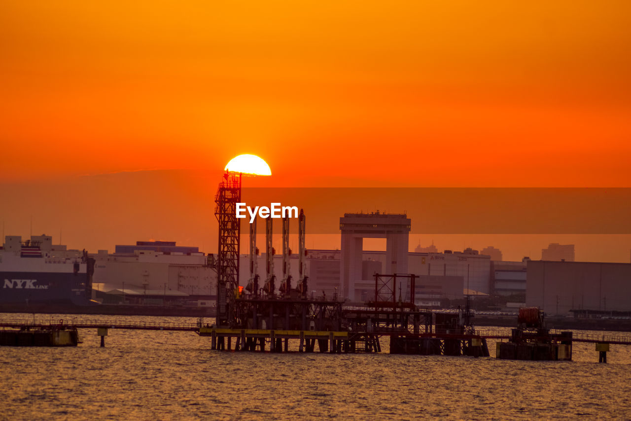 view of illuminated city at sunset