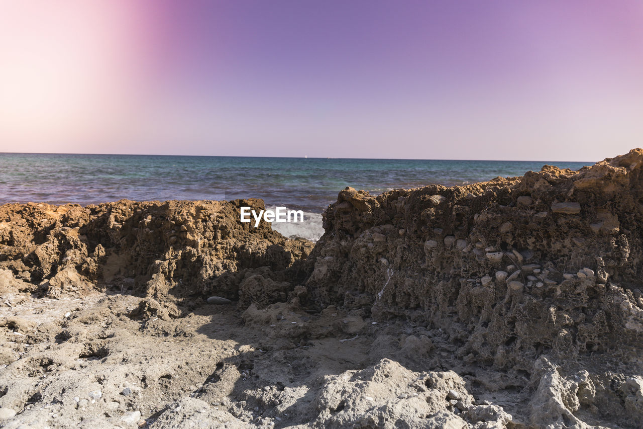 PANORAMIC SHOT OF SEA AGAINST CLEAR SKY