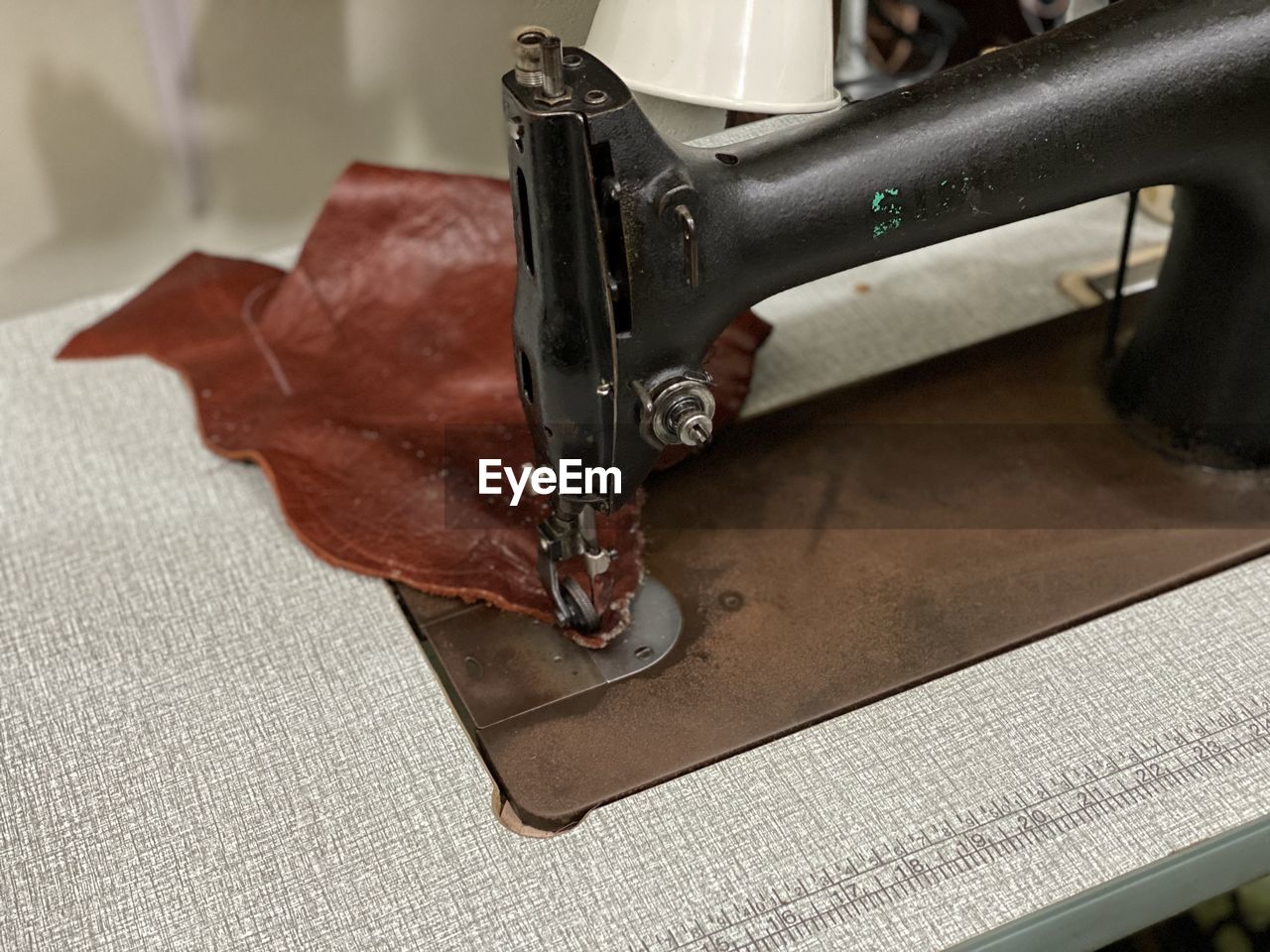 High angle view of sewing machine on table