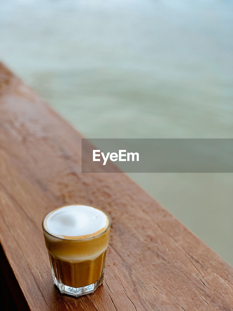 CLOSE-UP OF BEER ON TABLE