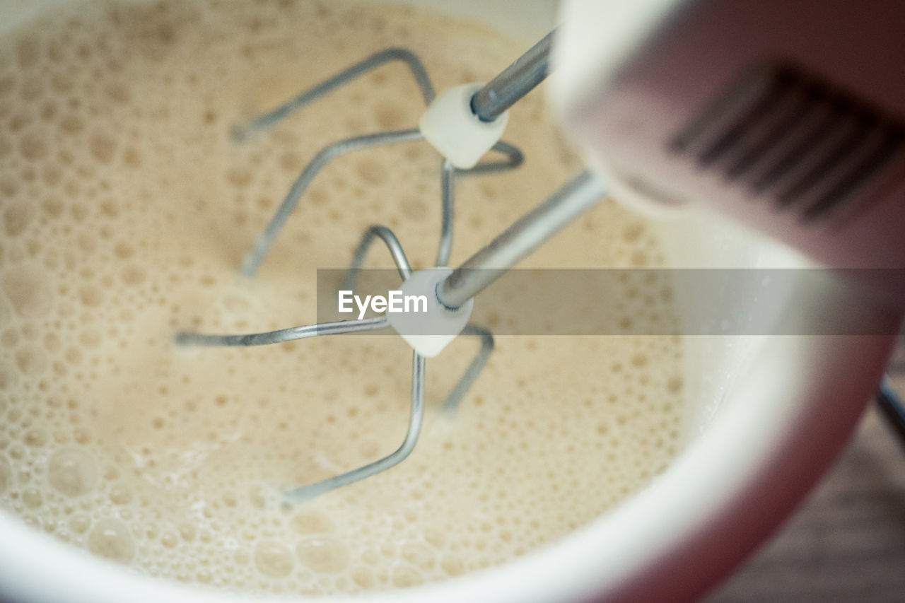 Close-up of mixer mixing food