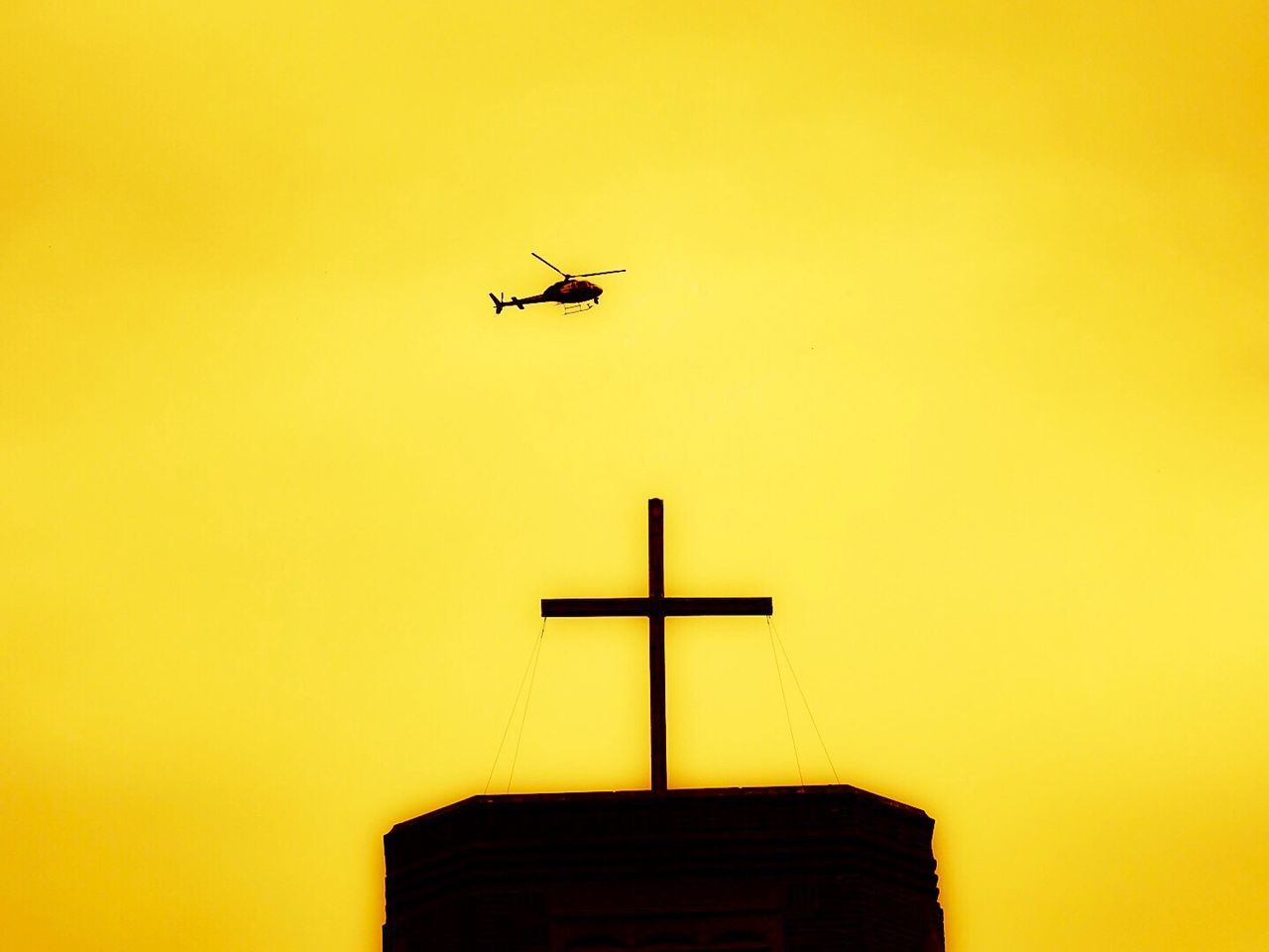 LOW ANGLE VIEW OF SILHOUETTE AIRPLANE AGAINST SKY