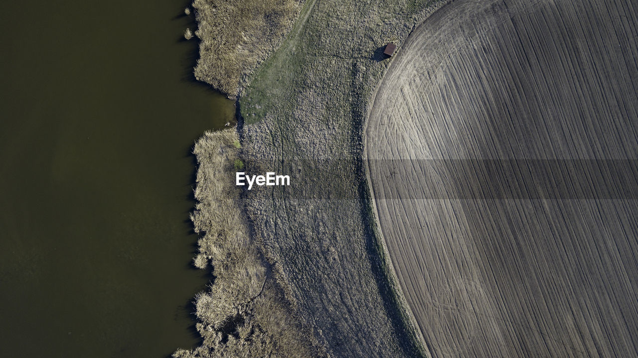 Aerial view of landscape by sea