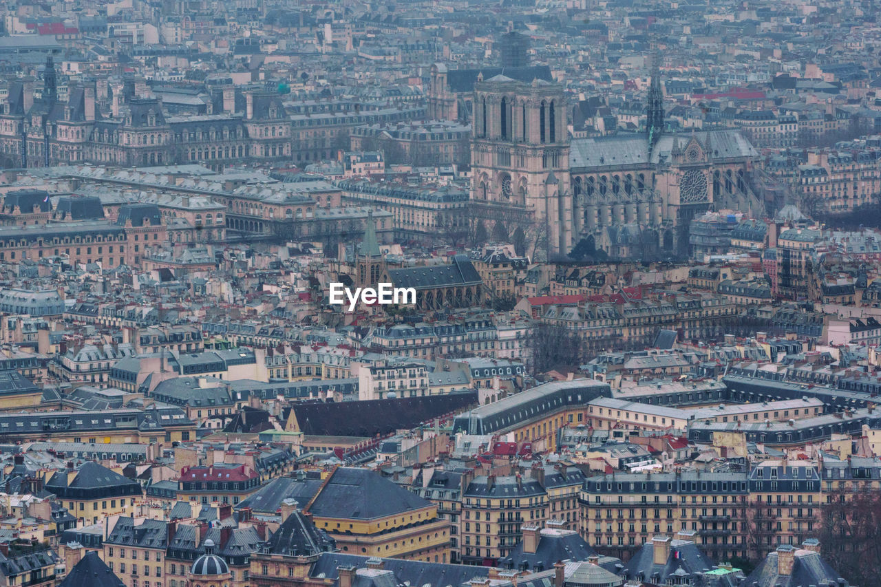 A high-view of the center of paris, france in low light.