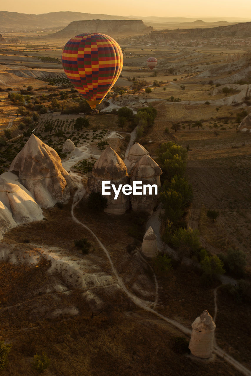 Aerial view of hot air balloon over city