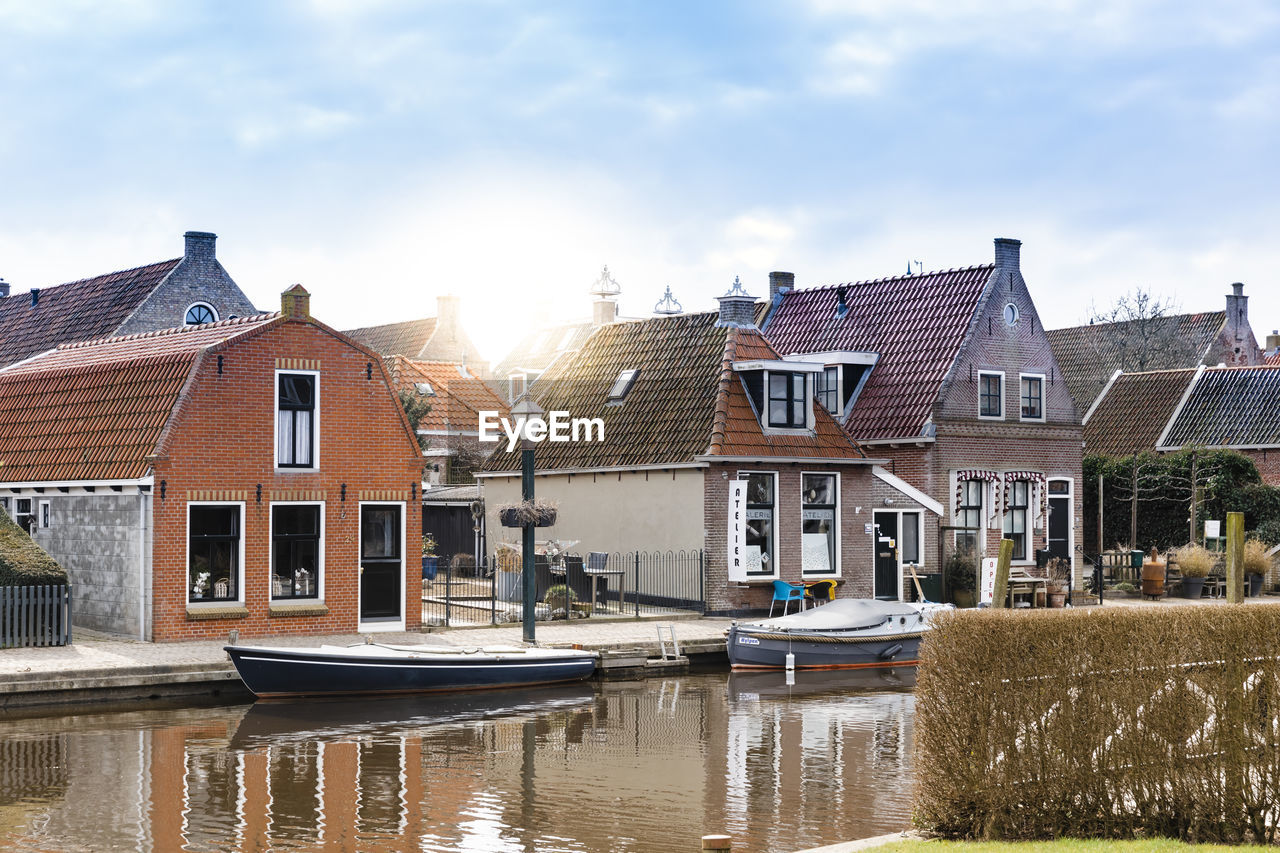 Houses by canal